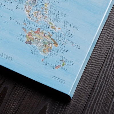 Bottom right corner of the Dive Map canvas of the world lying flat on a table