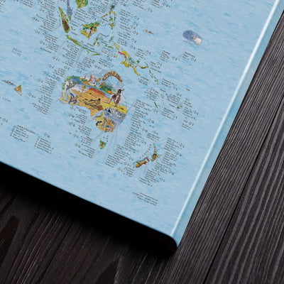 Bottom right corner of the Surftrip Map canvas of the world lying flat on a table