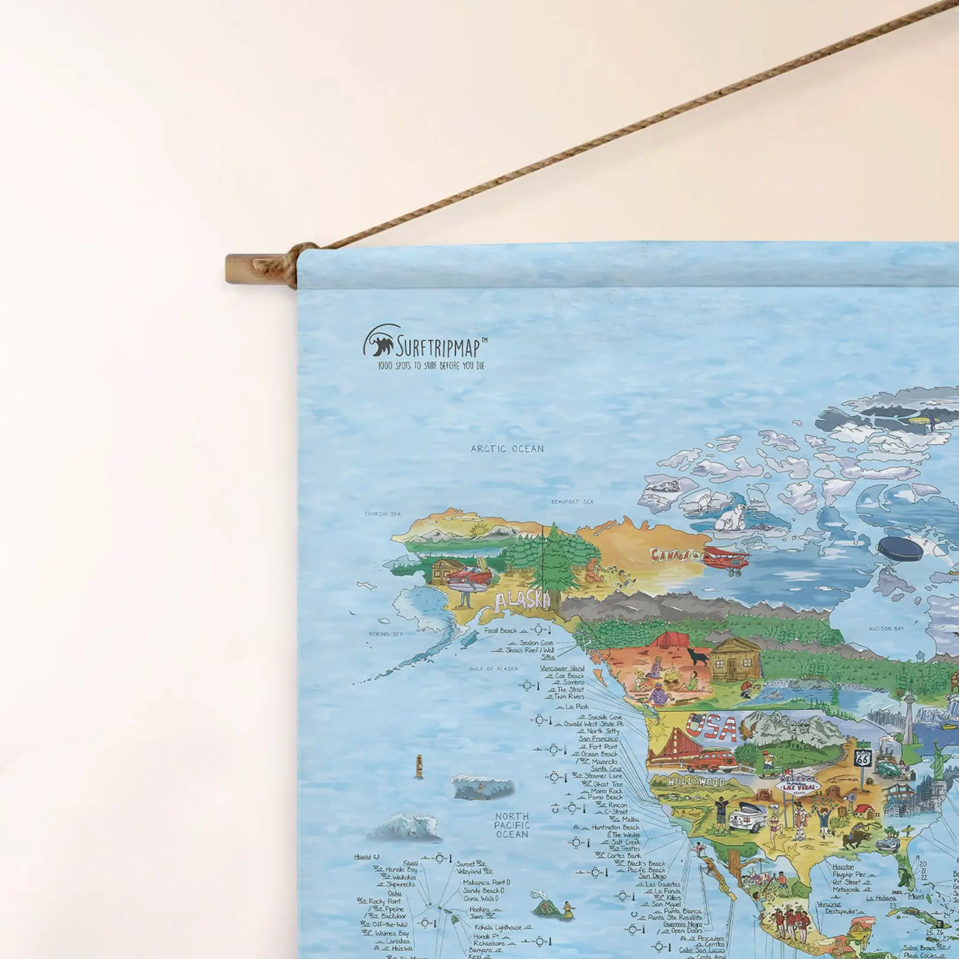 Top left corner of the Surftrip Map roll down canvas of the world hanging on a wall