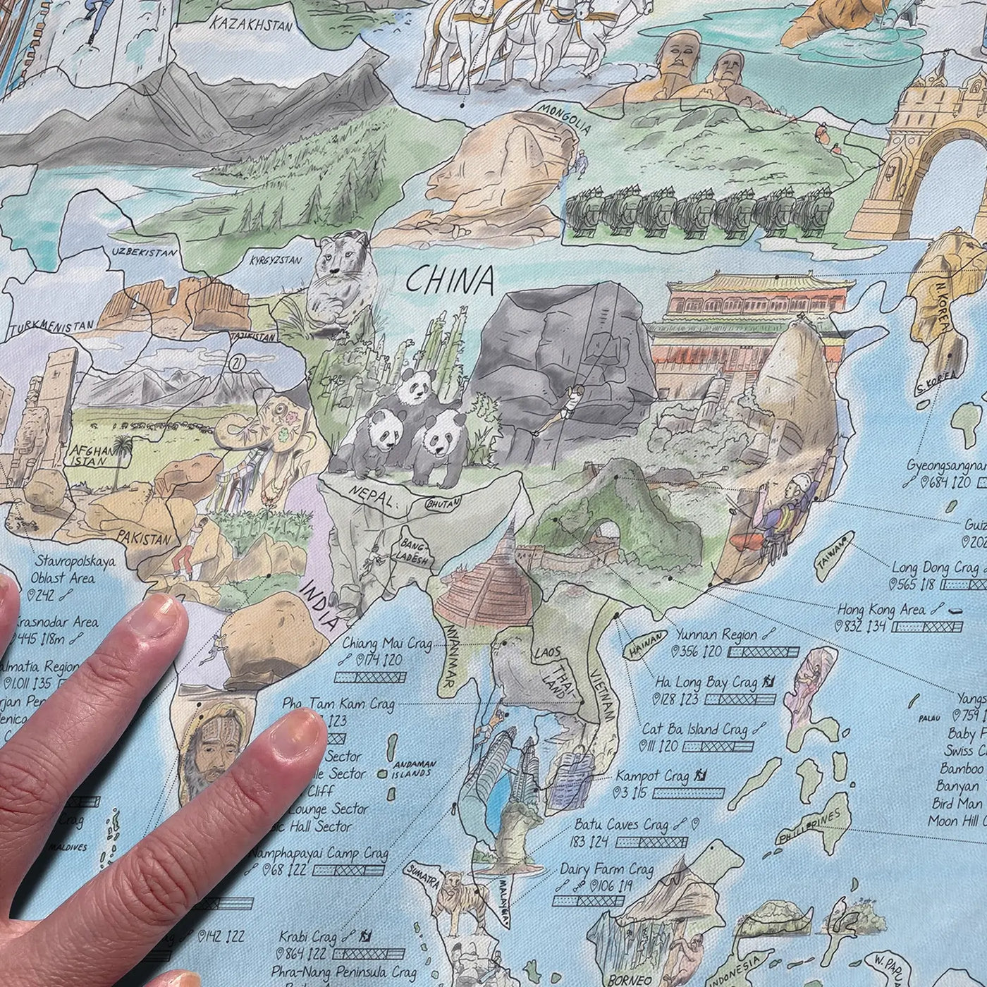 Close-up of the Climbing Map towel highlighting icons on type of climb and heights